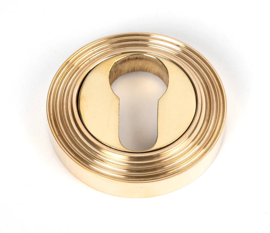 FTA 50594 POLISHED BRASS ROUND EURO ESCUTCHEON (BEEHIVE)