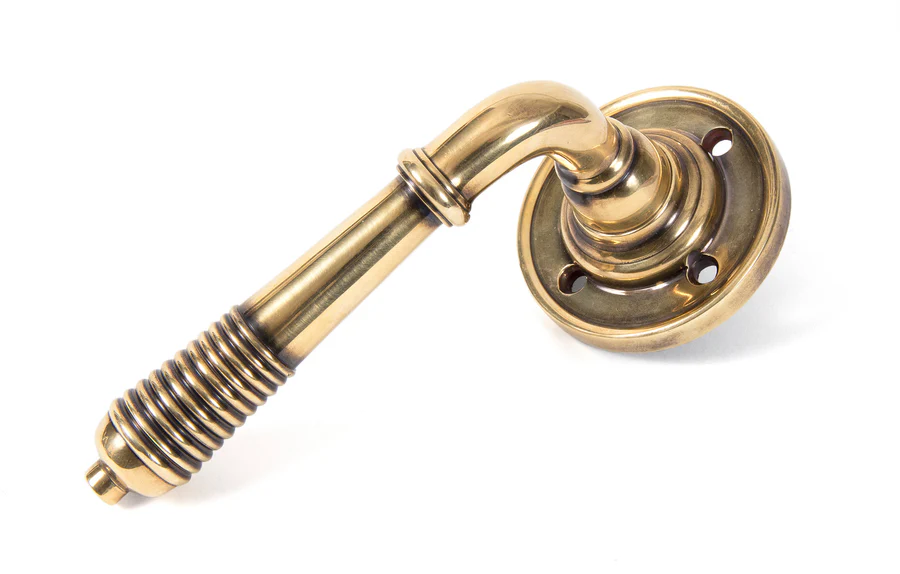 FTA 50086 AGED BRASS REEDED LEVER ON ROSE SET - UNSPRUNG