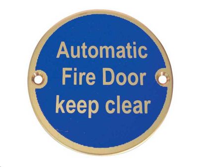 SIGN - AUTOMATIC FIRE DOOR KEEP CLEAR 76MM DIA POLISHED BRASS